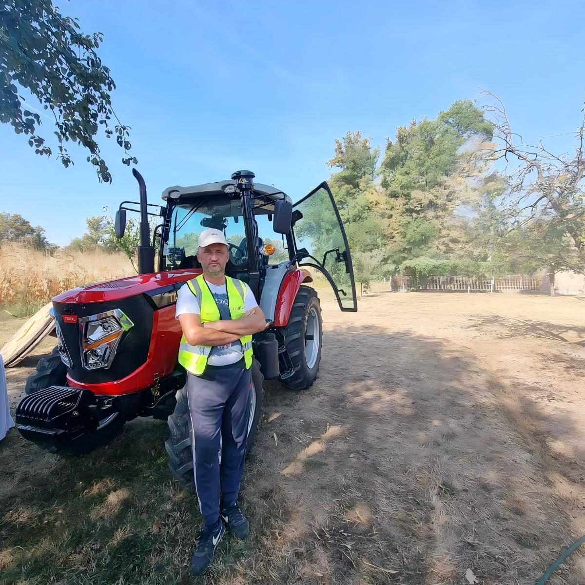 Agricultural Wheel Tractor operating in a rural farming field